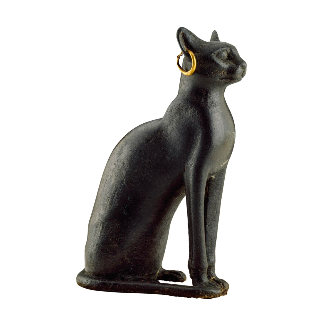 Copper statue of the cat goddess Bastet. Eighth to fourth centuries B.C. PHOTOGRAPH BY MARY EVANS/SCALA, FLORENCE
